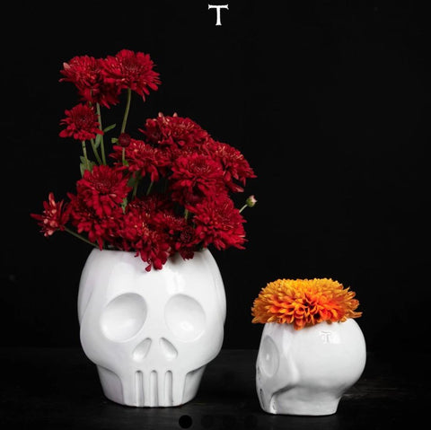 Set 2 floreros blancos calaveras